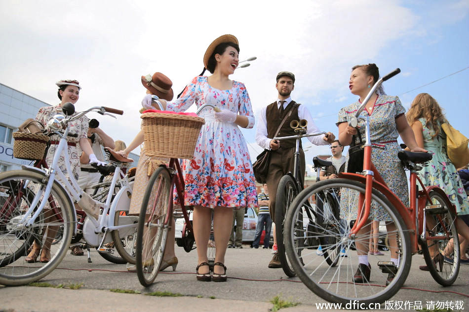 Dressed in vintage clothes participants in St