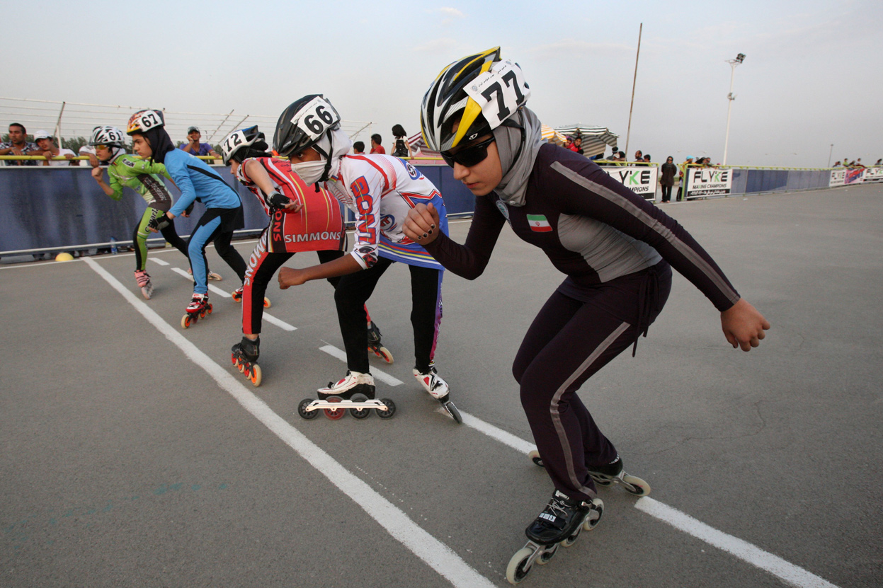  Iranian rollerbladers wait to hear whistle of referee, to start their competition, in a women's rollerblading championship league, at the Azadi (Freedom) sport complex, in Tehran, on June 30, 2011. (AP Photo/Vahid Salemi) # 