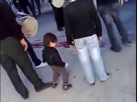 Dancing Kid in Iranian Religious Mourning Parade
